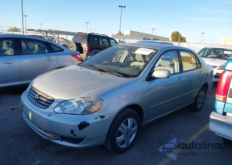 2004 Toyota Corolla Le z USA, uszkodzony, nr VIN JTDBR32E142021359